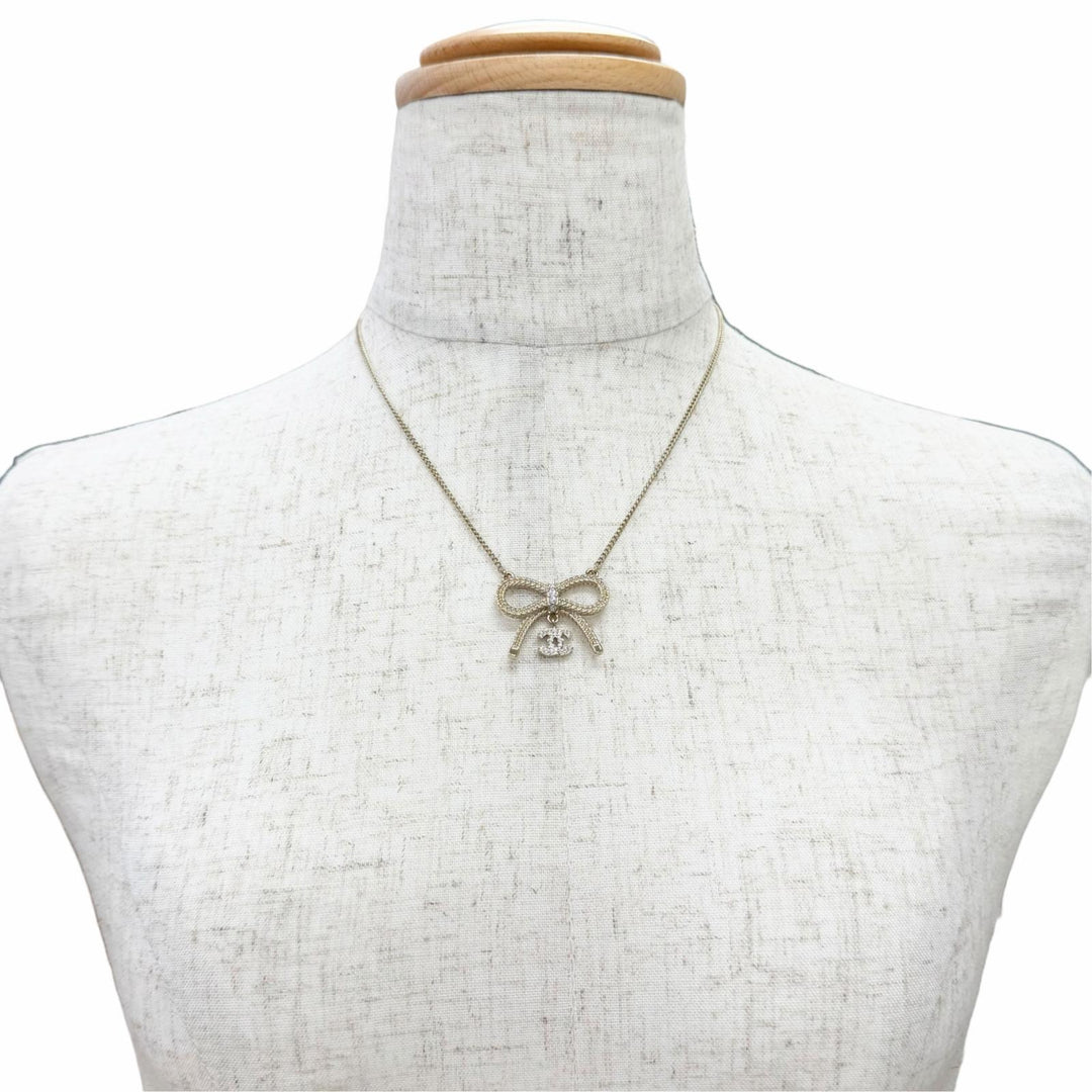 Excellent CHANEL Necklace COCO Mark Rhinestone Ribbon gold Women B24K ABE650
