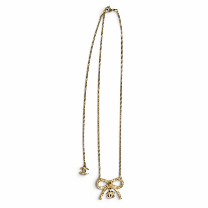 Excellent CHANEL Necklace COCO Mark Rhinestone Ribbon gold Women B24K ABE650