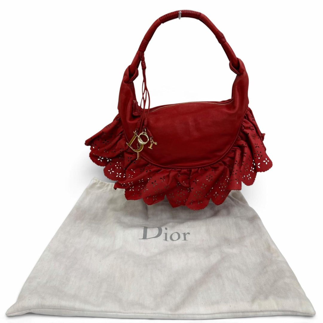 Excellent Christian Dior Rare Galliano-era logo charm, perforated frill one belt