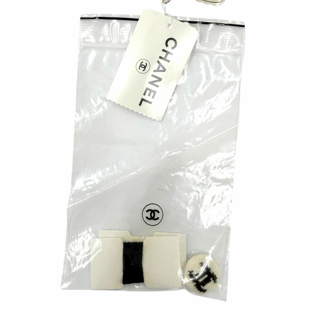 Pristine CHANEL knit COCO Mark Button Sleeveless Ivory cashmere 38 02A P19859