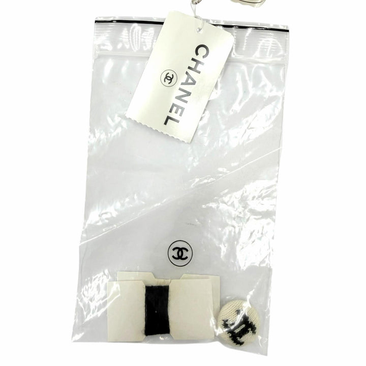 Pristine CHANEL knit COCO Mark Button Sleeveless Ivory cashmere 38 02A P19859