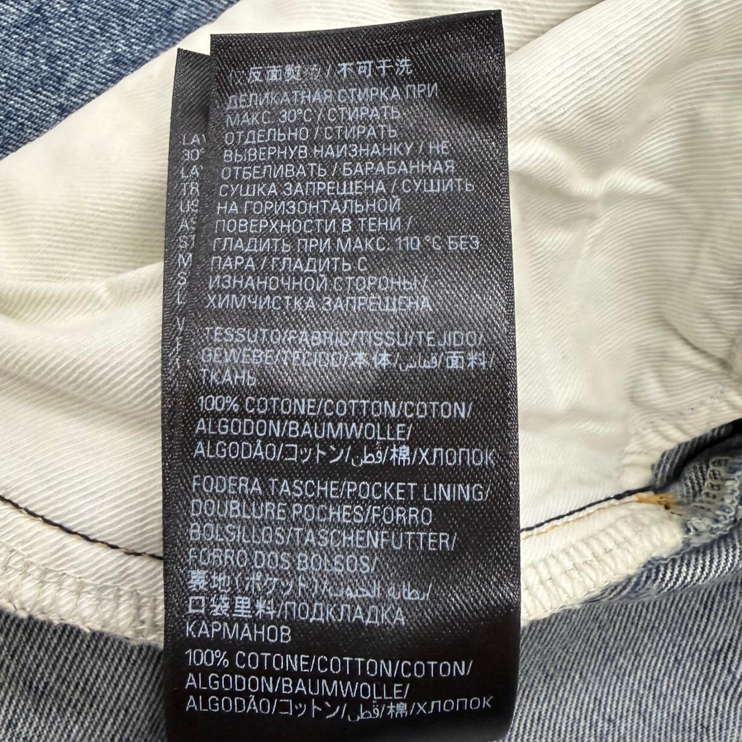 Great BALENCIAGA Denim pants Distressed finish, all-over logo prin. 28 745094