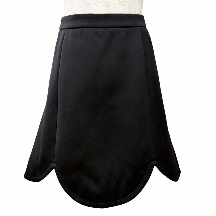 Pristine LOUIS VUITTON flare skirt shorts monogram lining and scalloped hem 34