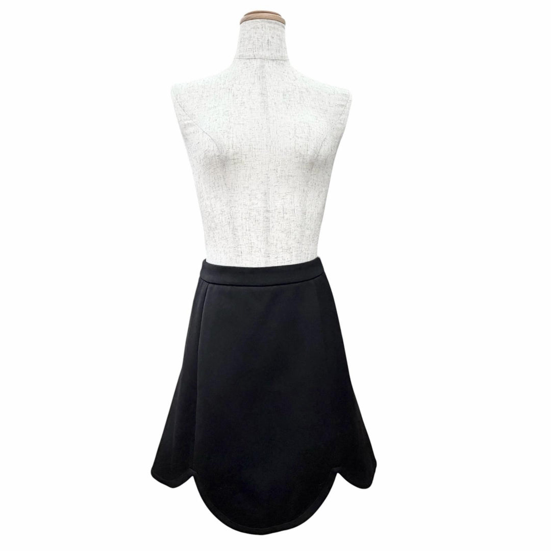 Pristine LOUIS VUITTON flare skirt shorts monogram lining and scalloped hem 34