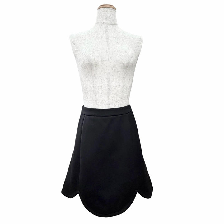 Pristine LOUIS VUITTON flare skirt shorts monogram lining and scalloped hem 34