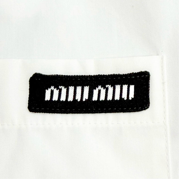 Pristine MIUMIU Long sleeve shirt Logo patch poplin shirt white cotton 38 DNA067