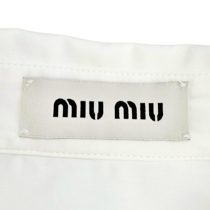 Pristine MIUMIU Long sleeve shirt Logo patch poplin shirt white cotton 38 DNA067