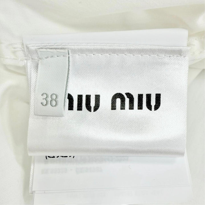 Pristine MIUMIU Long sleeve shirt Logo patch poplin shirt white cotton 38 DNA067