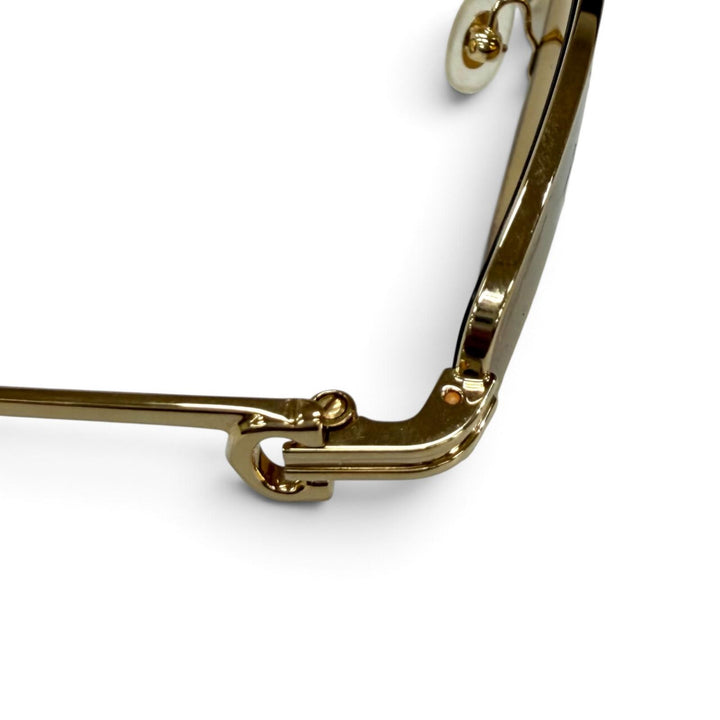 Pristine Cartier sunglasses Première de Cartier 2C Decor Cat's Eye gold CT0155S