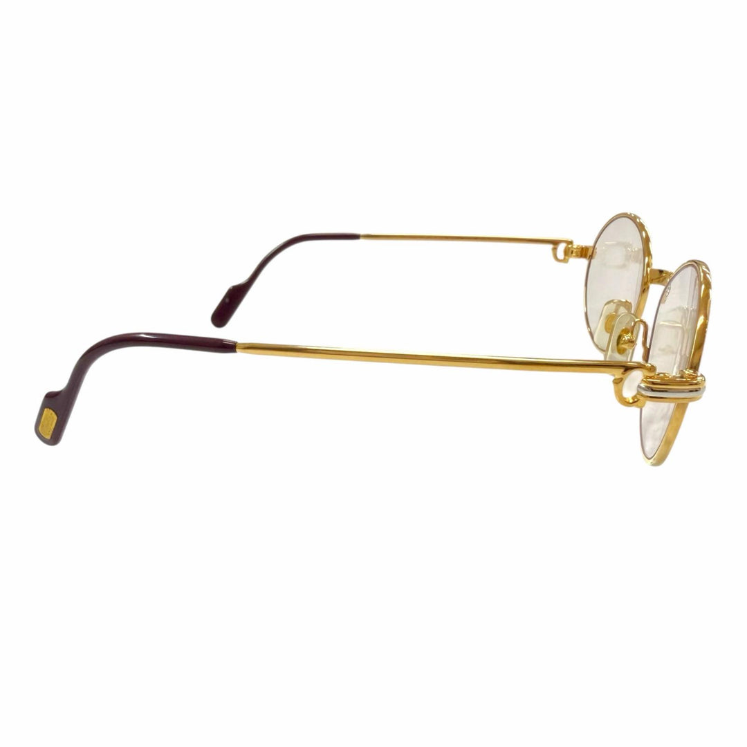 Great Cartier Glasses Trinity Oval frame with metal logo and colored lenses.