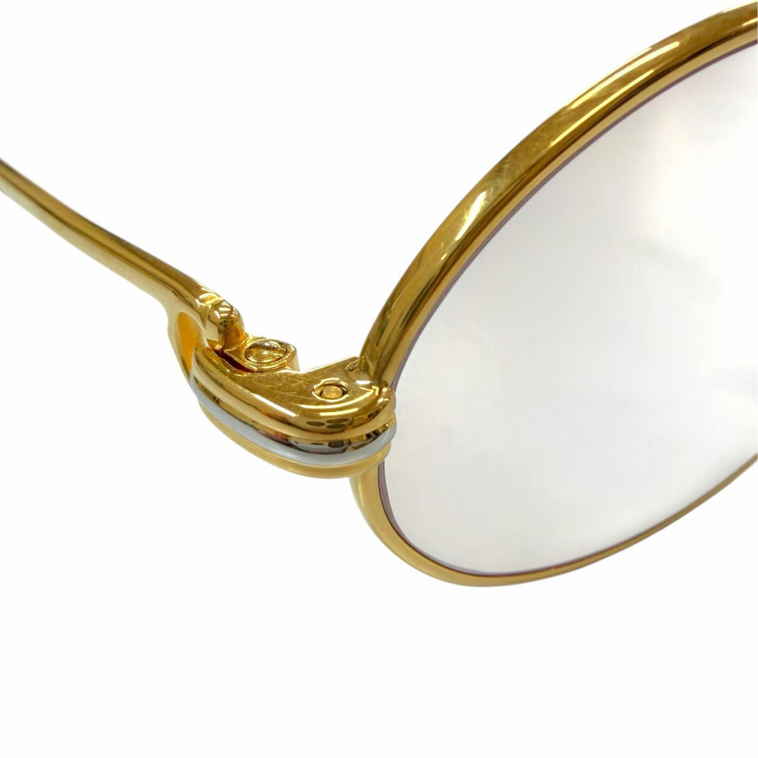 Great Cartier Glasses Trinity Oval frame with metal logo and colored lenses.