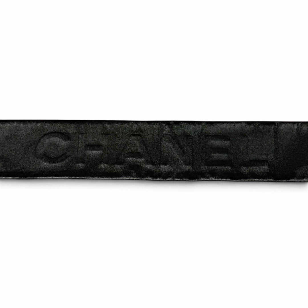 Great CHANEL Stall Logo embossed long leather black Women S A25S
