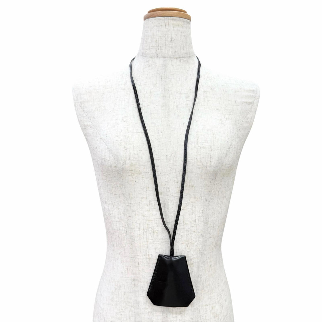 Great HERMES Necklace Margiela era leather clochette long black leather Women